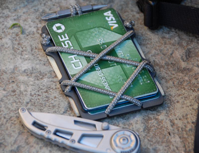 Cache Tool holding credit cards