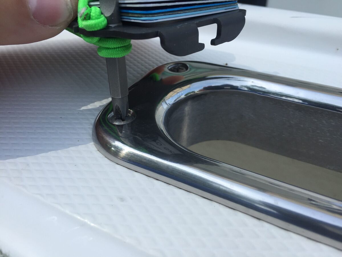Cache Tool screwdriver on boat hardware